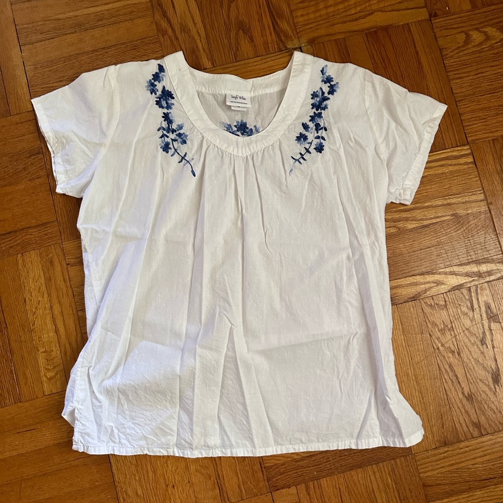 White linen blouse size M with blue embroidered flowers. Excellent condition
